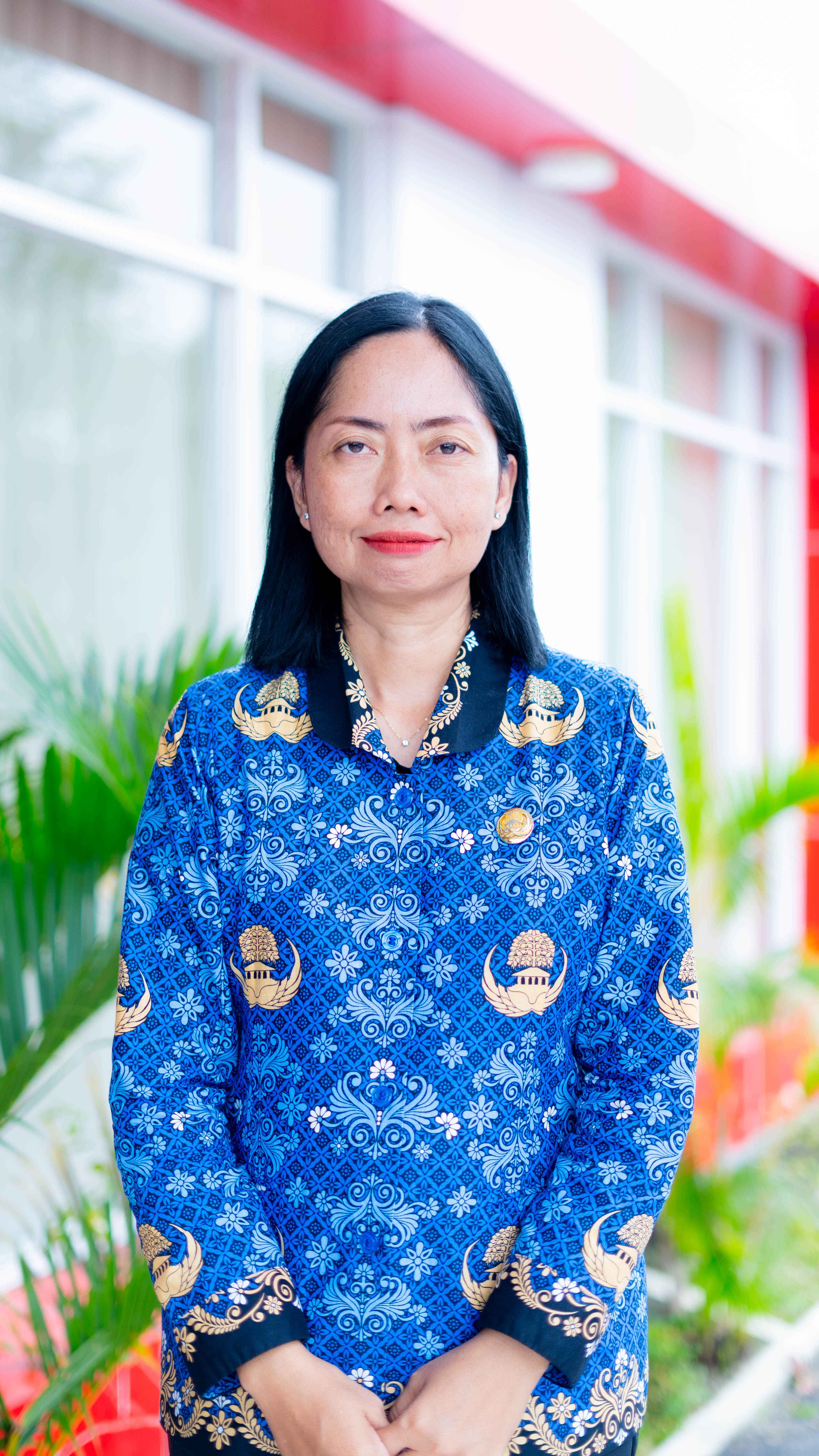 EVINA SAPUTRI SALUNDIK,SE